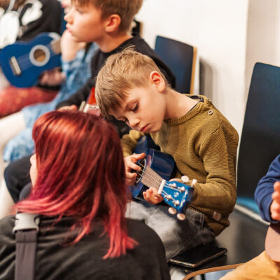 Okładka galerii Warsztat gry na ukulele I Festiwal Cały Poznań Ukulele I Dzieciaki na Piętrze 2023